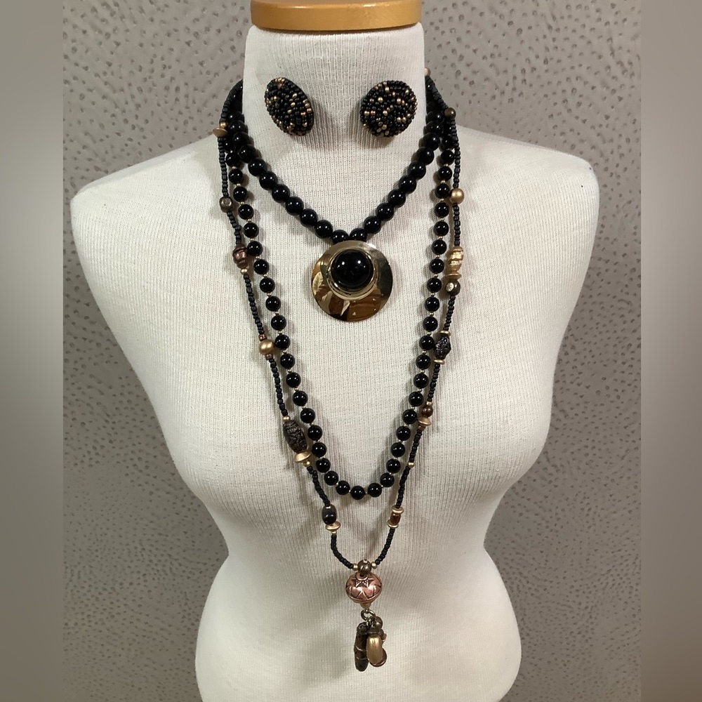 3 necklaces, one pair of earrings Elegant Black and Gold Jewelry Set